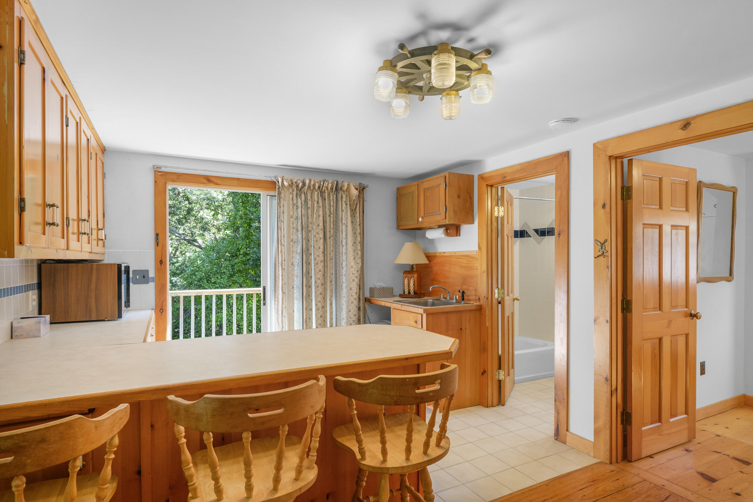 10 Mc Guerty Road Eastham, MA 02642 - Photo 24 of 39 a bedroom with a bed and a dresser