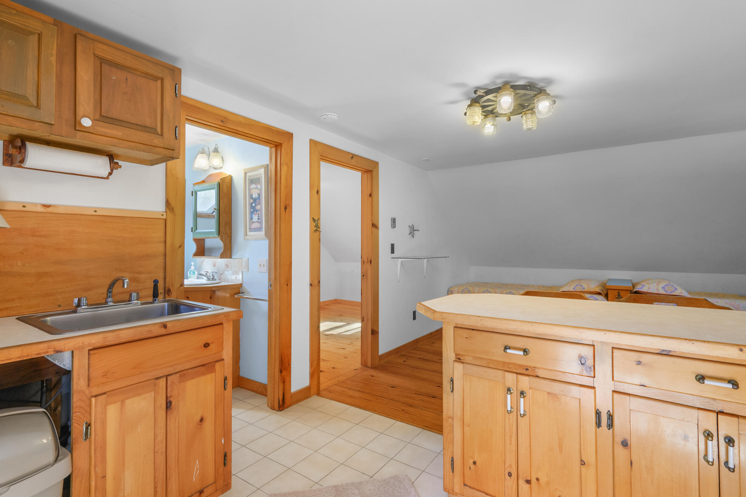 10 Mc Guerty Road Eastham, MA 02642 - Photo 26 of 39 a utility room with cabinets washer and dryer