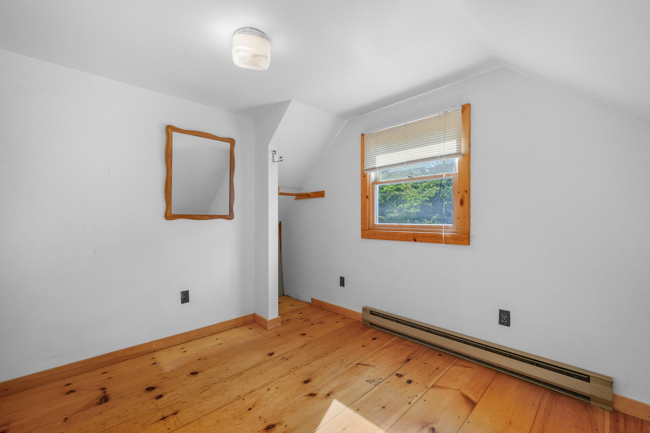 10 Mc Guerty Road Eastham, MA 02642 - Photo 30 of 39 a view of a room with wooden floor and a window