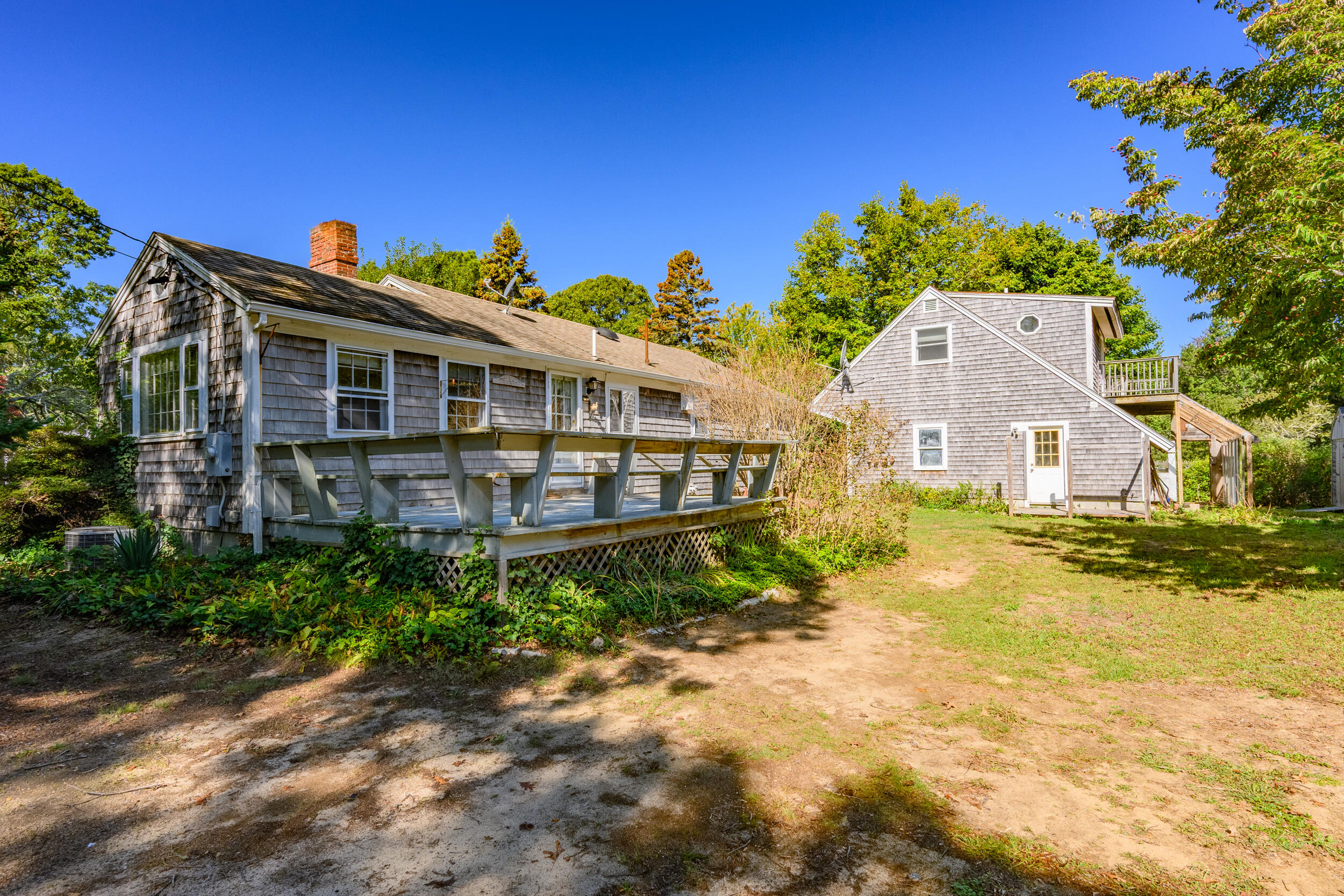 10 Mc Guerty Road Eastham, MA 02642 - Photo 35 of 39 a front view of a house with a yard