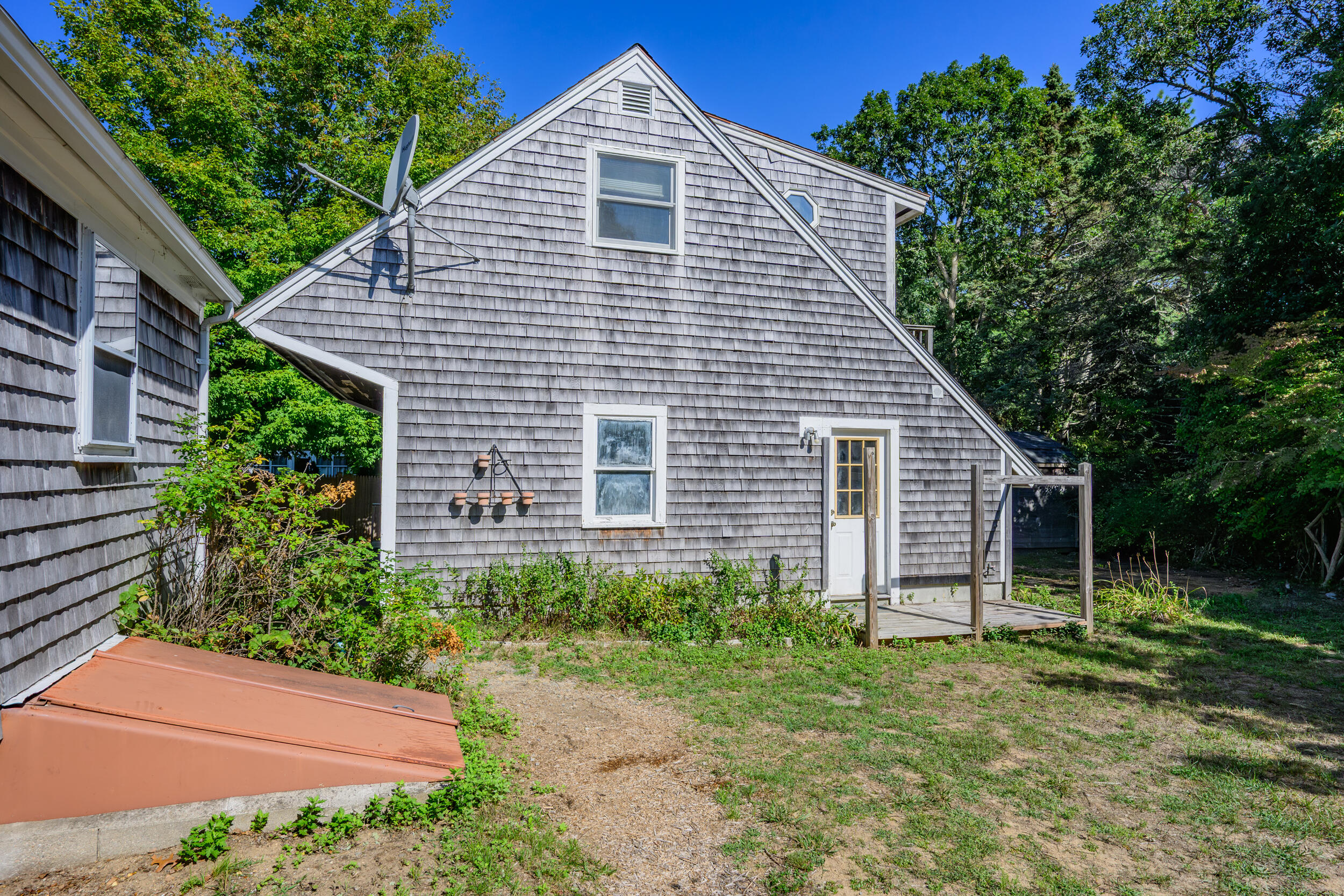 10 Mc Guerty Road Eastham, MA 02642 - Photo 36 of 39 a front view of a house with garden