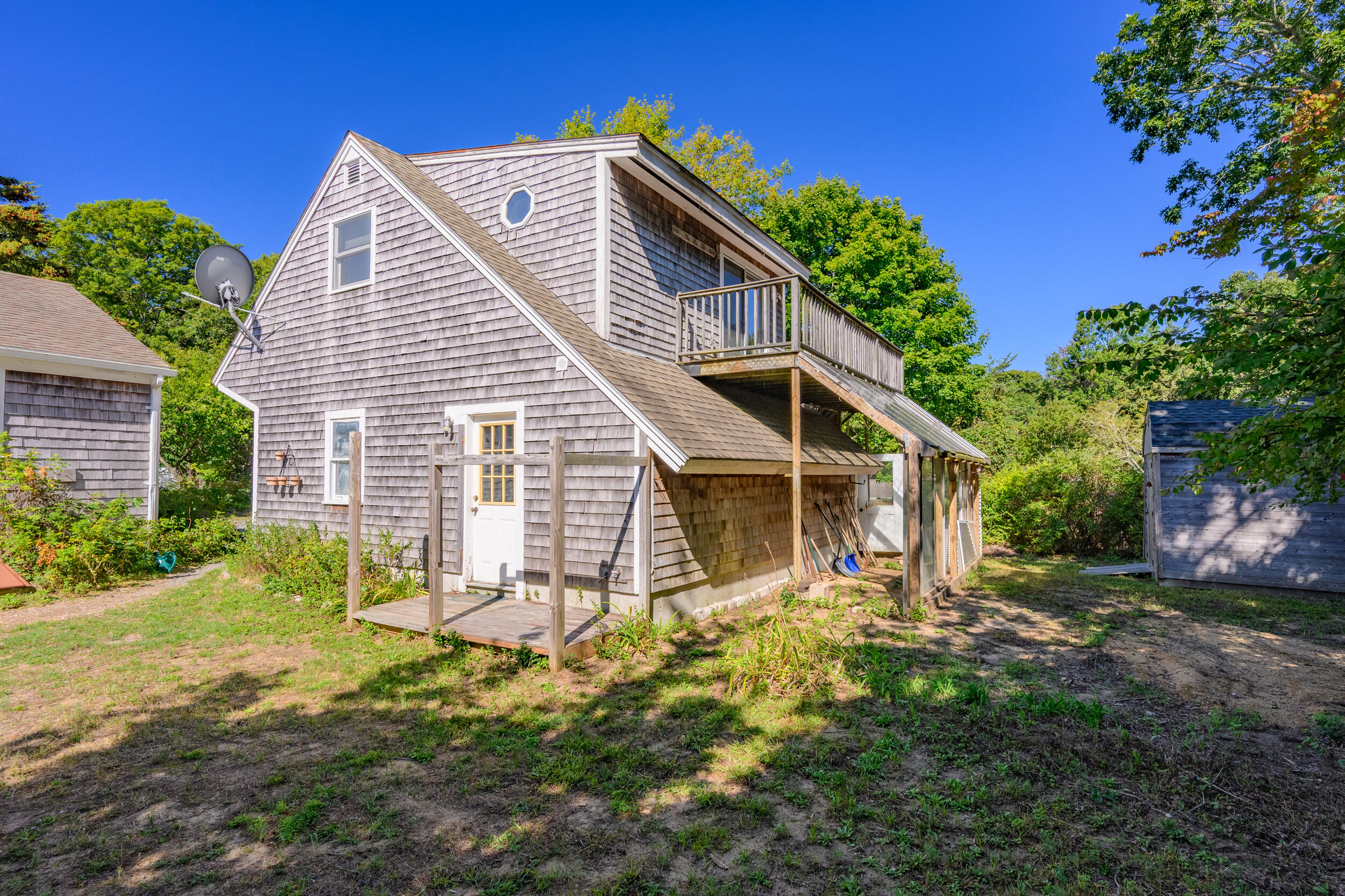 10 Mc Guerty Road Eastham, MA 02642 - Photo 37 of 39 a view of a house with a yard