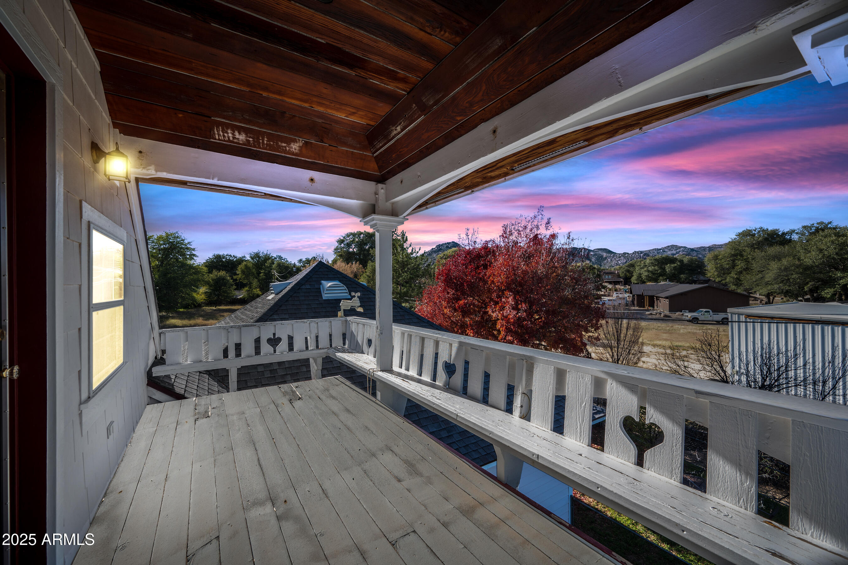 17288 Foothill Road Yarnell, AZ 85362 - Photo 56 of 79 a view of balcony with wooden floor and outdoor seating