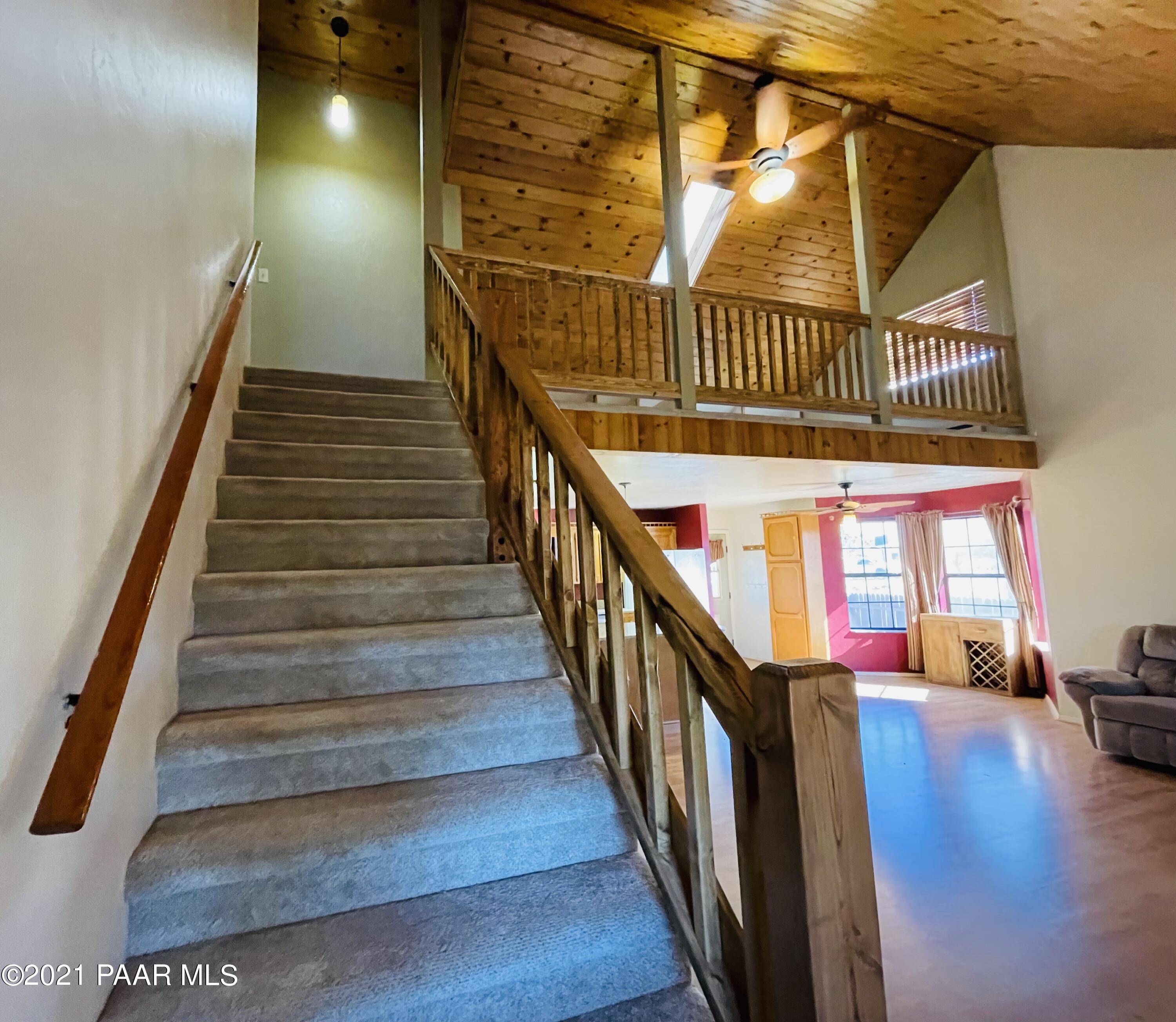 2895 North Reed Road Chino Valley, AZ 86323 - Photo 16 of 40 a view of entryway and hall with wooden floor