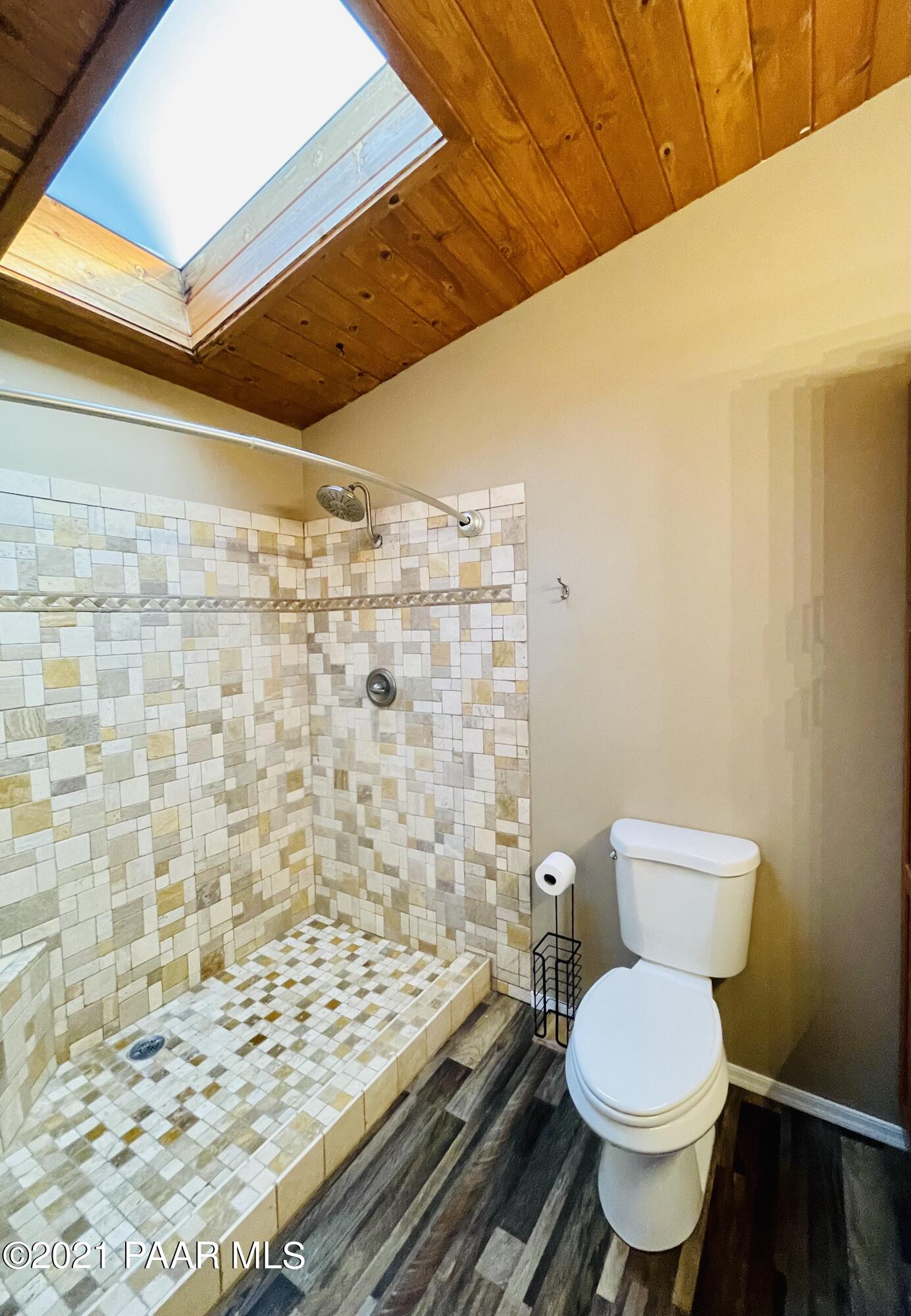 2895 North Reed Road Chino Valley, AZ 86323 - Photo 21 of 40 a bathroom with a sink and a toilet