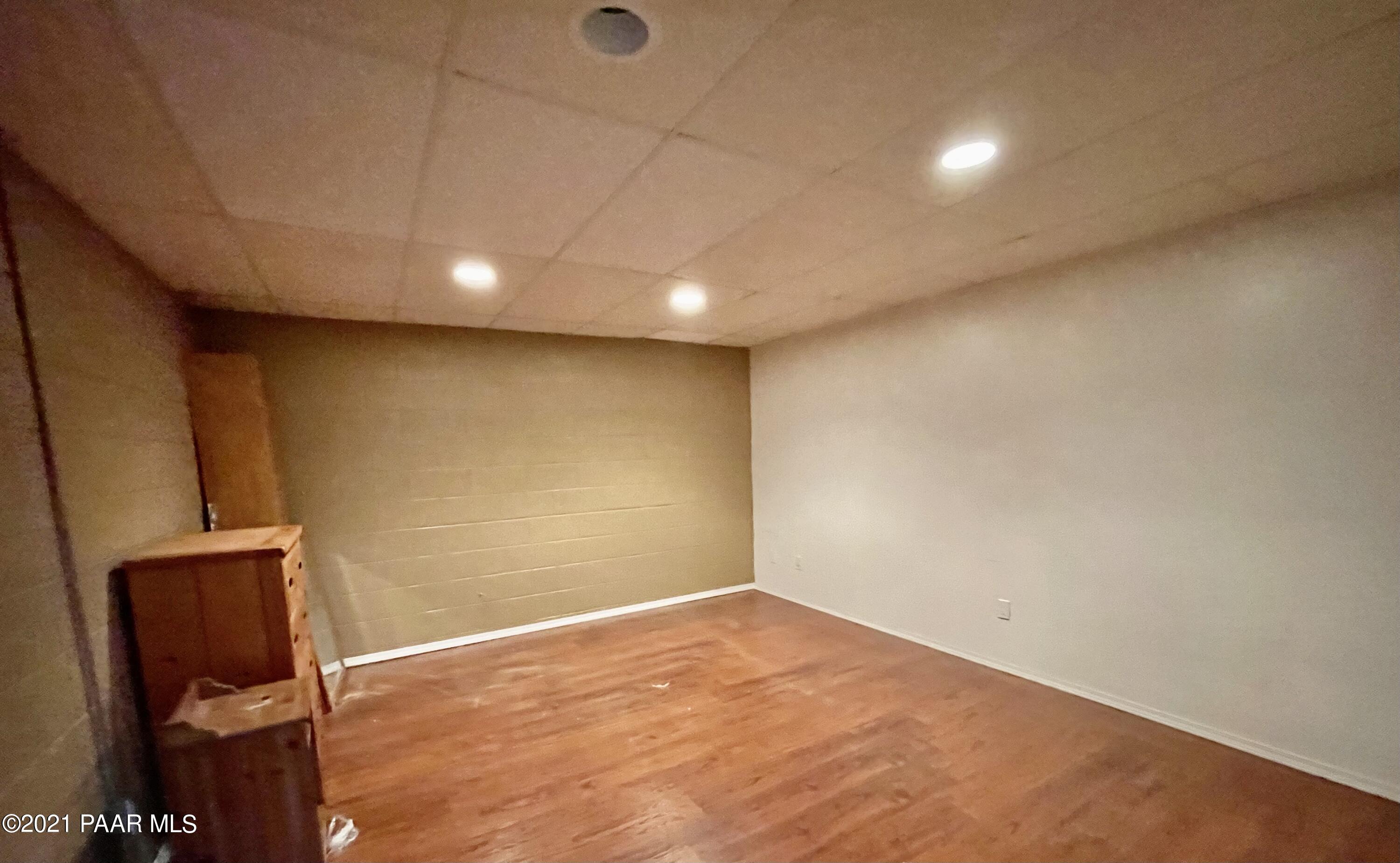 2895 North Reed Road Chino Valley, AZ 86323 - Photo 26 of 40 an empty room with wooden floor