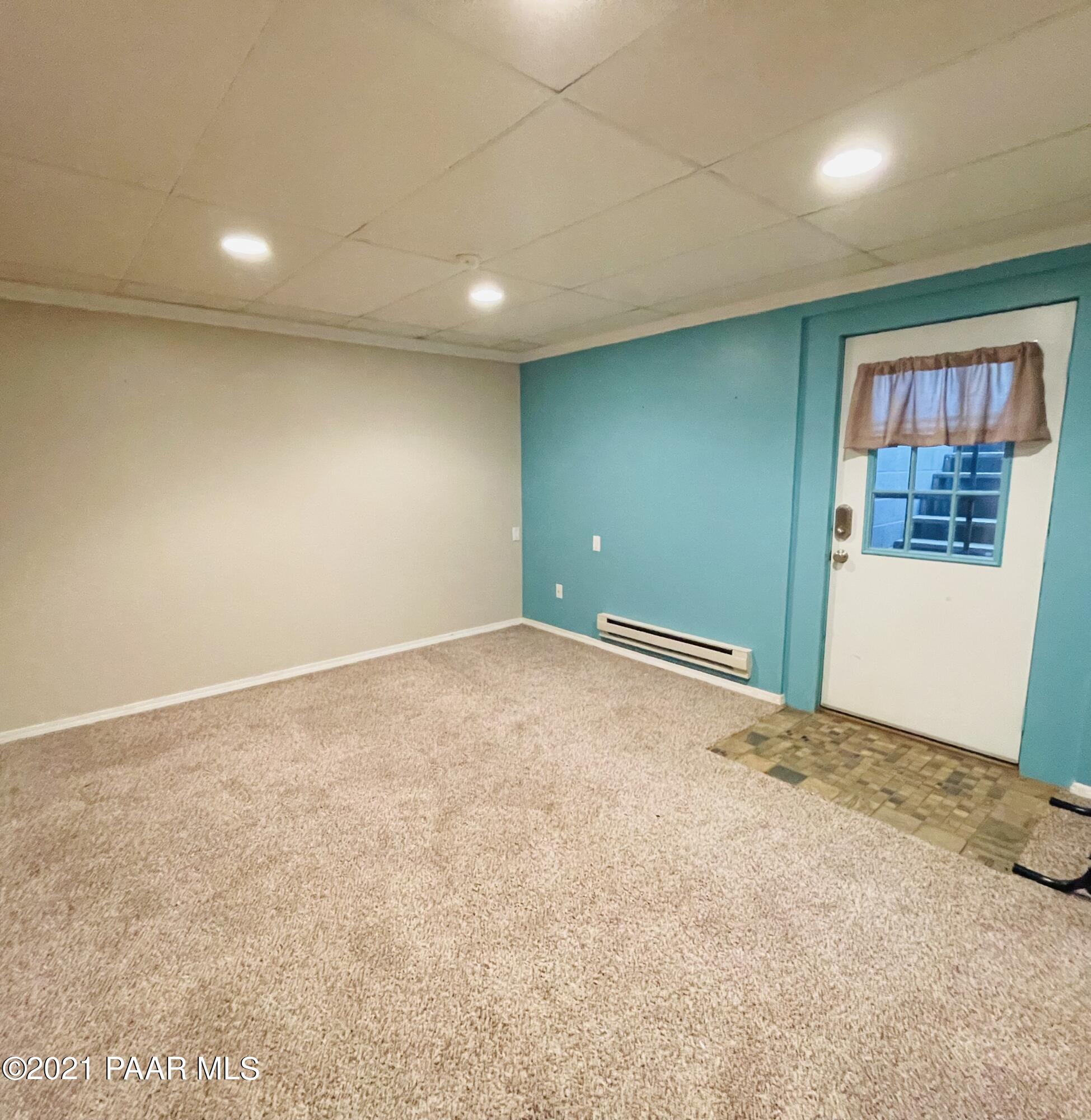 2895 North Reed Road Chino Valley, AZ 86323 - Photo 27 of 40 an empty room with windows