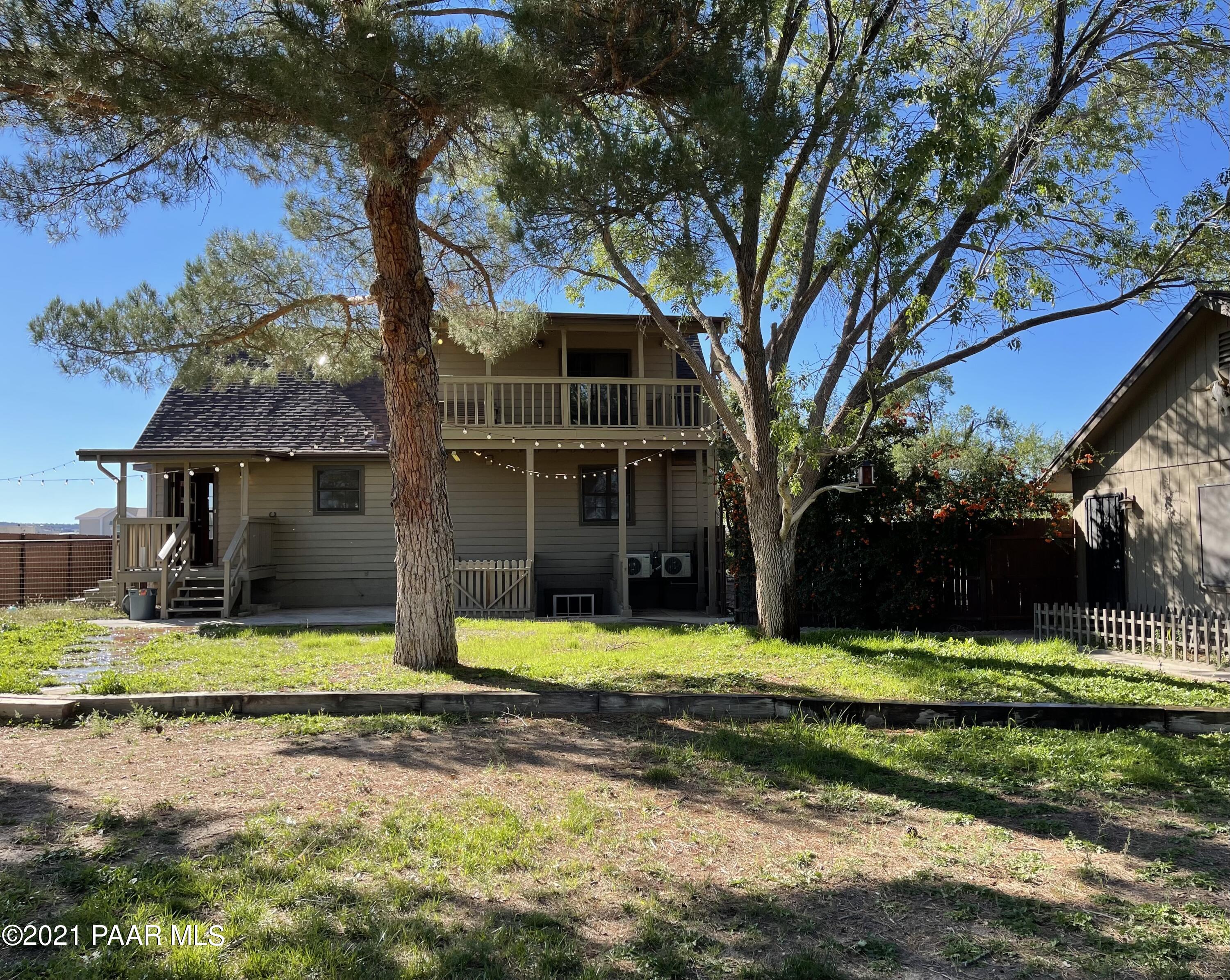 2895 North Reed Road Chino Valley, AZ 86323 - Photo 31 of 40 a view of a house with swimming pool and yard