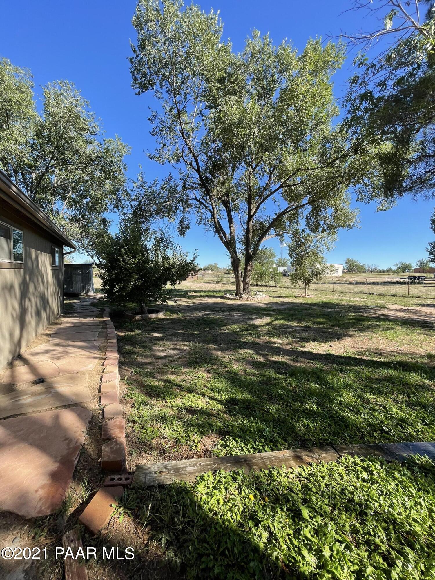2895 North Reed Road Chino Valley, AZ 86323 - Photo 35 of 40 a view of a yard with an outdoor space