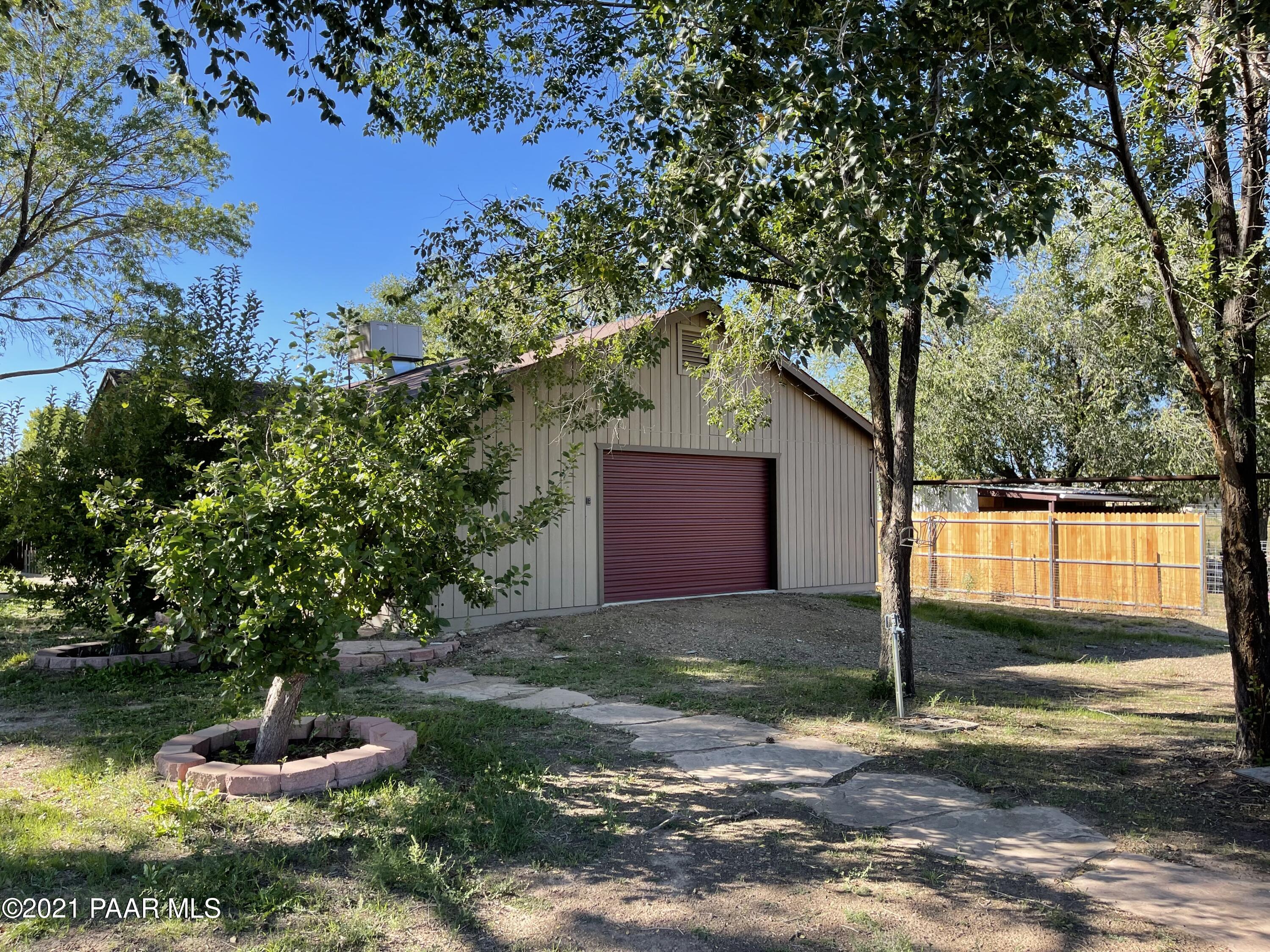 2895 North Reed Road Chino Valley, AZ 86323 - Photo 36 of 40 a big yard with palm trees