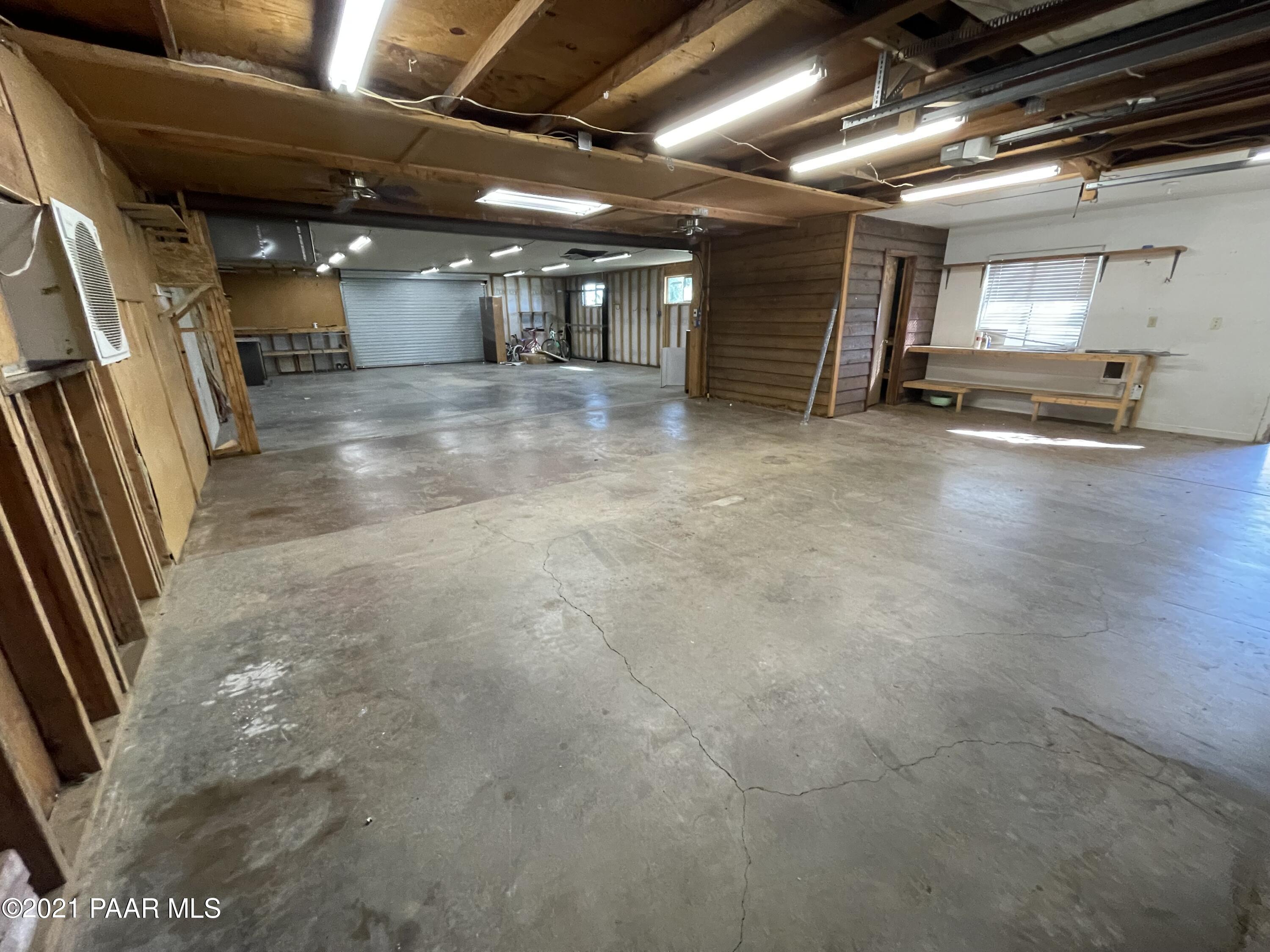 2895 North Reed Road Chino Valley, AZ 86323 - Photo 37 of 40 a view of an empty room with wooden floor