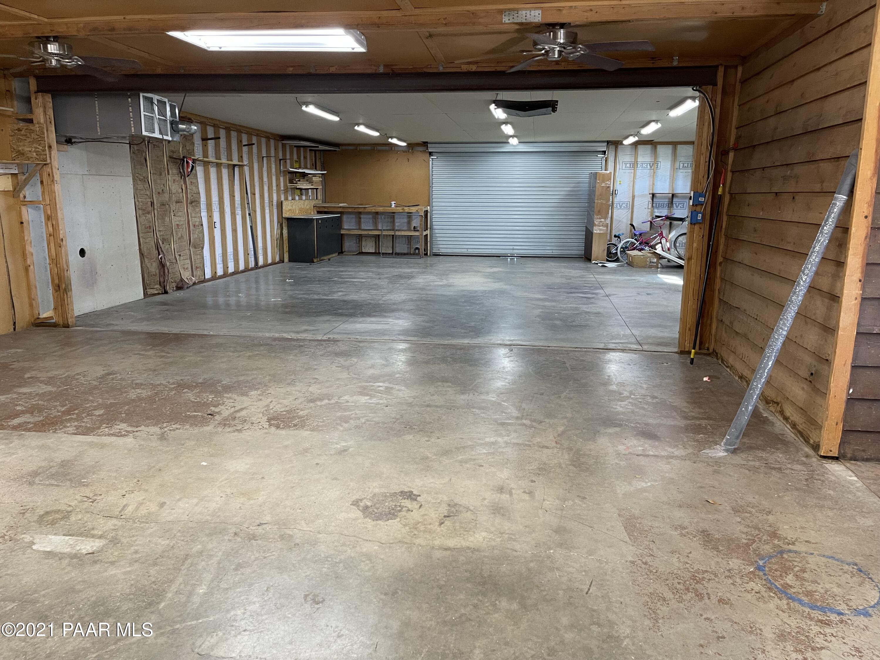2895 North Reed Road Chino Valley, AZ 86323 - Photo 38 of 40 a view of a hallway with retail shop