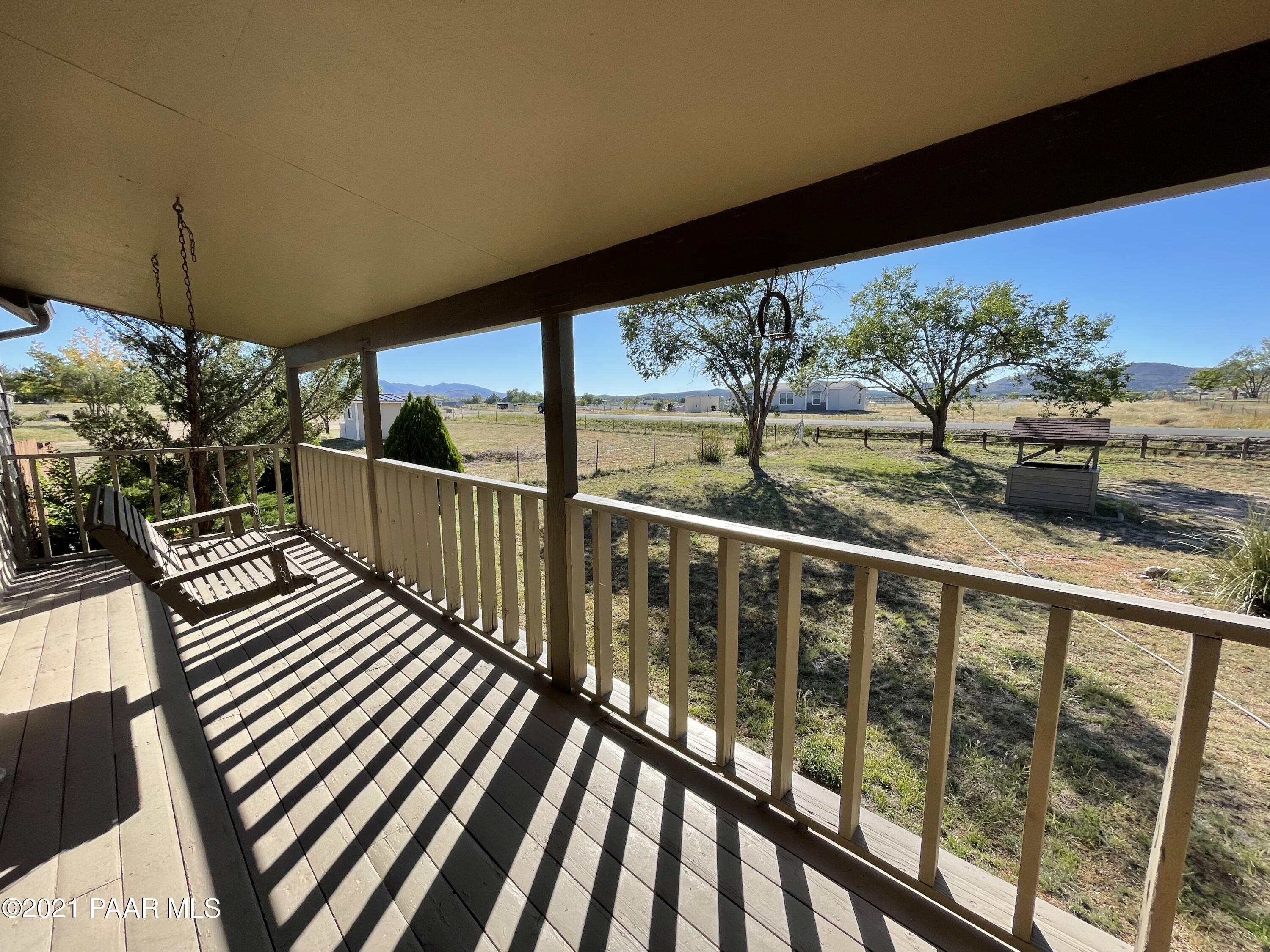 2895 North Reed Road Chino Valley, AZ 86323 - Photo 7 of 40 a view of balcony with wooden floor and outdoor space