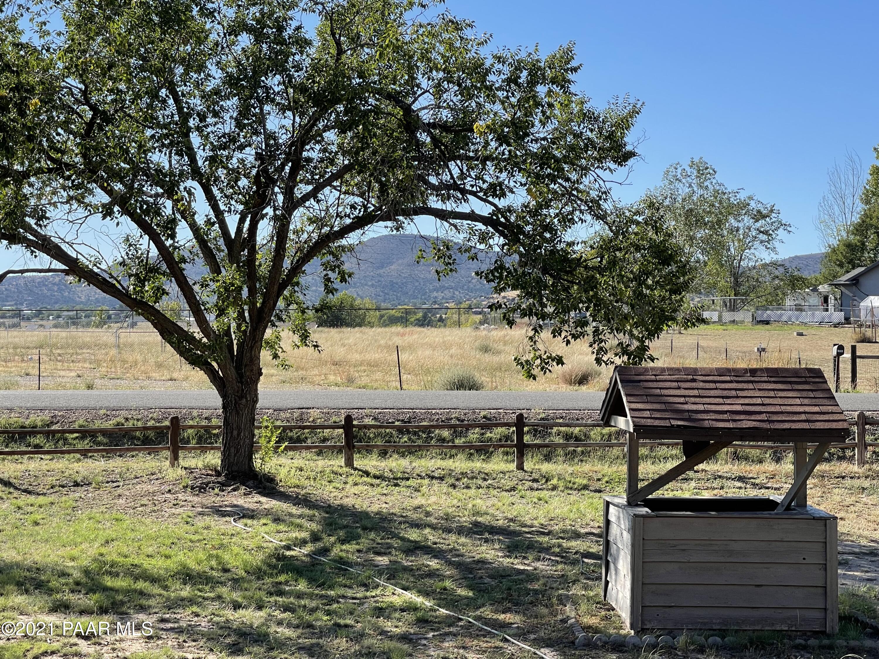 2895 North Reed Road Chino Valley, AZ 86323 - Photo 8 of 40 a view of a backyard with trees