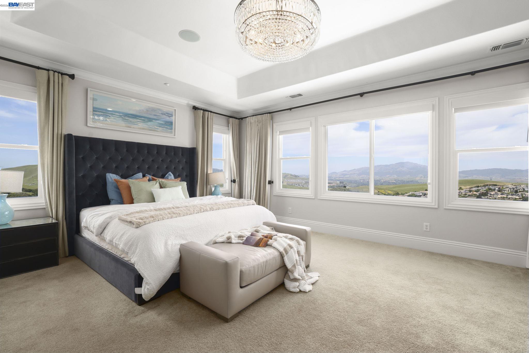 950 Winsford Court San Ramon, CA 94583 - Photo 41 of 68 a large bed sitting in a bedroom next to a window