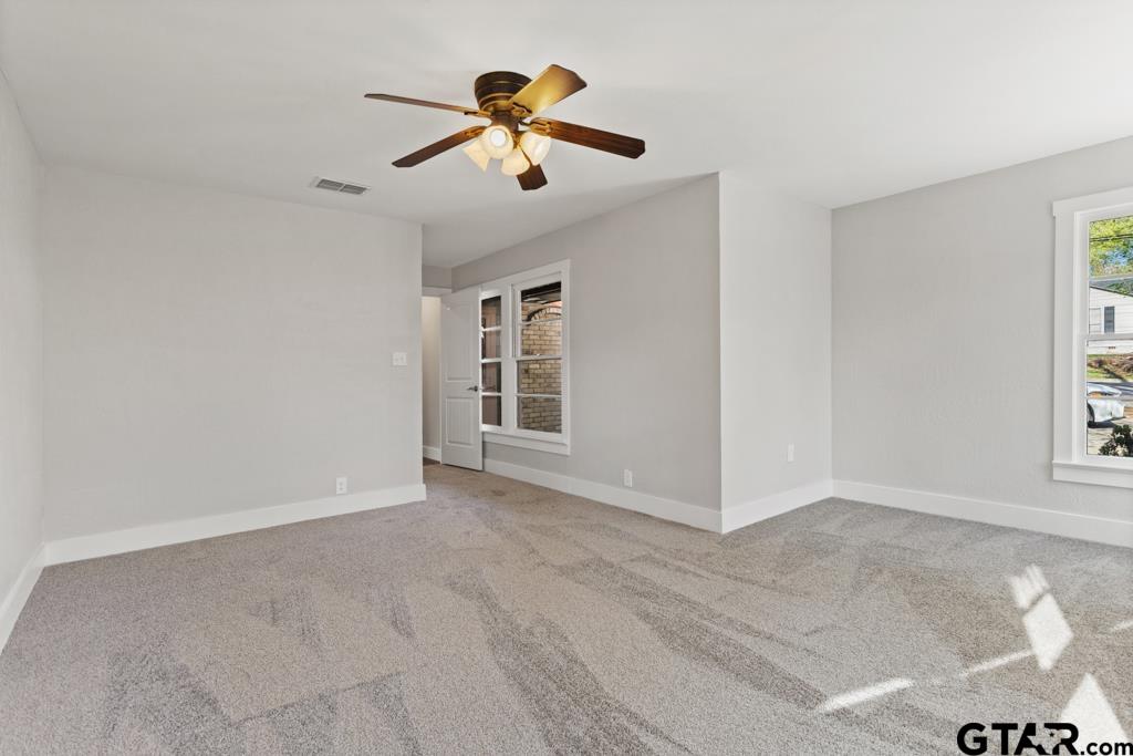 2819 New Copeland Road Tyler, TX 75701 - Photo 26 of 39 a view of livingroom with a ceiling fan and window