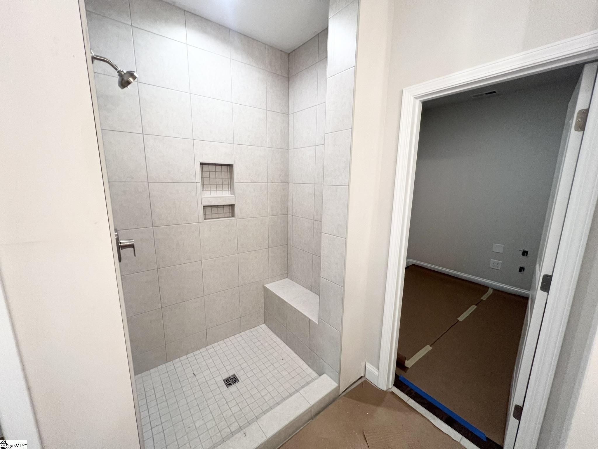 18 Hensley Road, Unit 82 Greenville, SC 29607 - Photo 9 of 26 Elegant tiled shower with frameless glass enclosure,