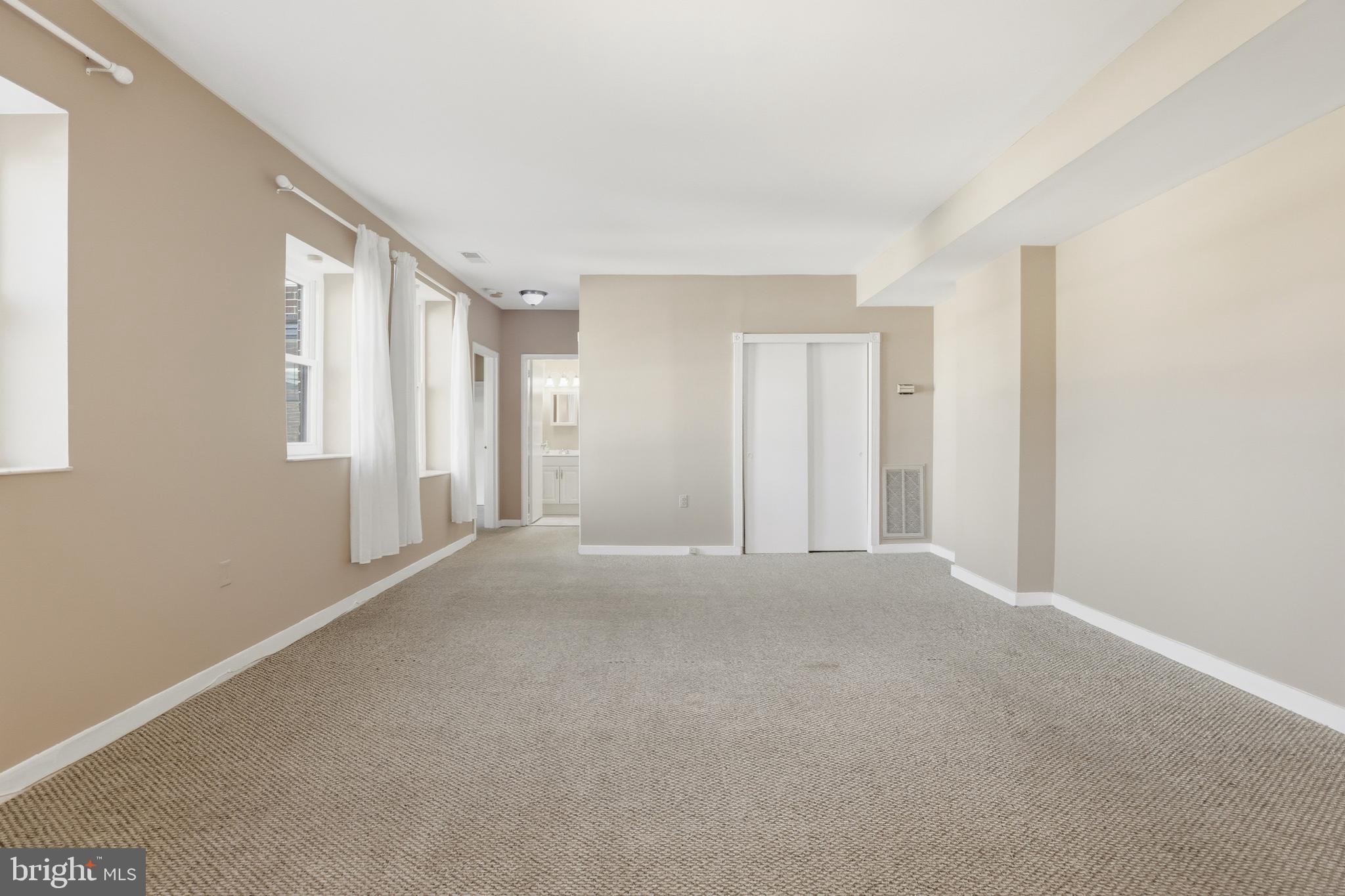 66 New York Avenue Northwest, Unit 403 Washington, DC 20001 - Photo 12 of 29 a view of an empty room with a window