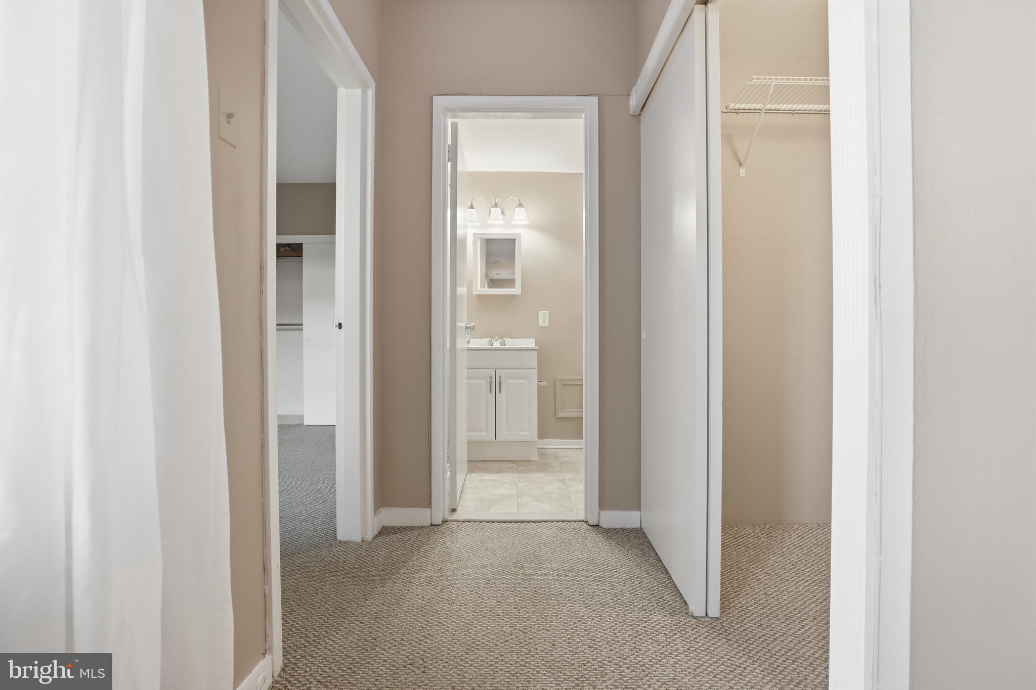 66 New York Avenue Northwest, Unit 403 Washington, DC 20001 - Photo 16 of 29 a view of a hallway with wooden floor