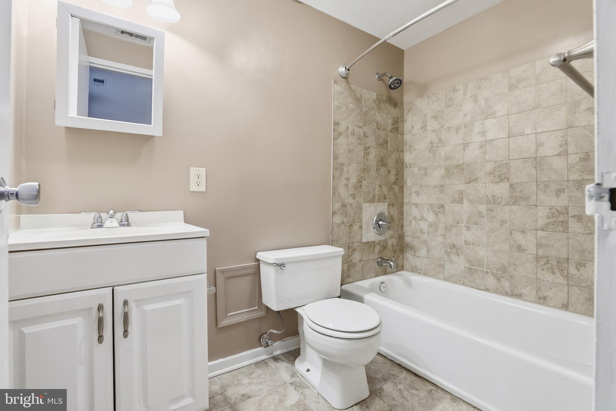 66 New York Avenue Northwest, Unit 403 Washington, DC 20001 - Photo 19 of 29 a bathroom with a sink toilet and shower