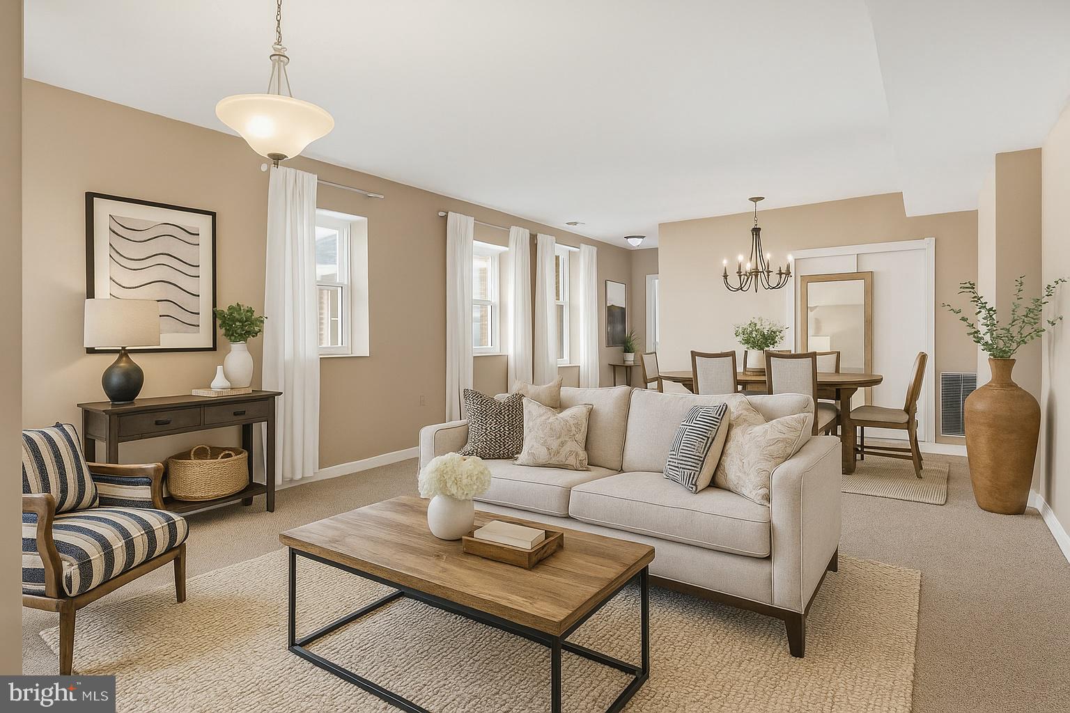 66 New York Avenue Northwest, Unit 403 Washington, DC 20001 - Photo 9 of 29 a living room with furniture and a chandelier