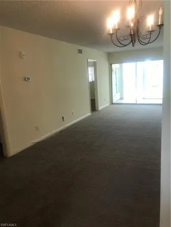 a view of swimming pool with a yard