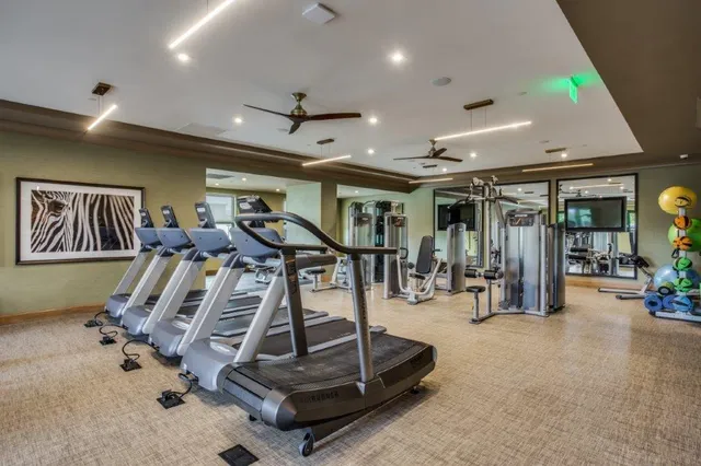 a view of a room with gym equipment