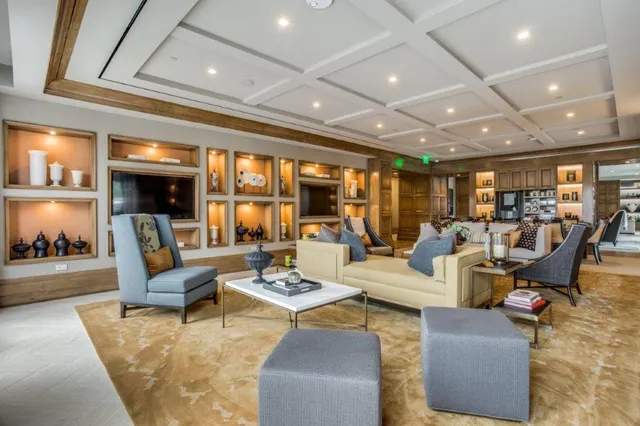 a view of a dining room with furniture and window