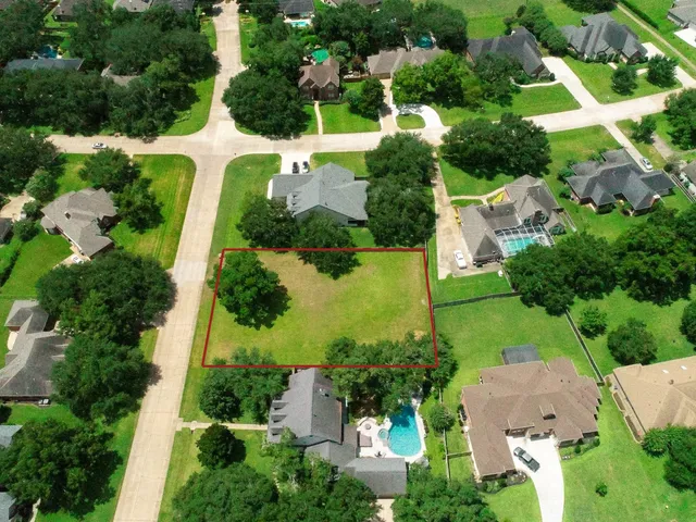 an aerial view of a house with a garden