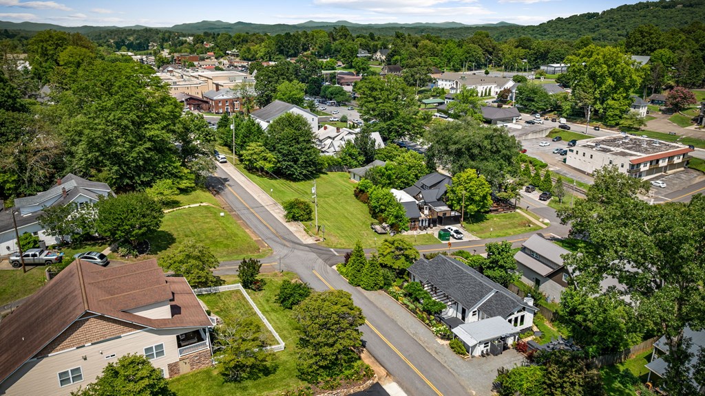 70 McKinney Street Blue Ridge, GA 30513 - Photo 2 of 79 an aerial view of residential houses with outdoor space and trees