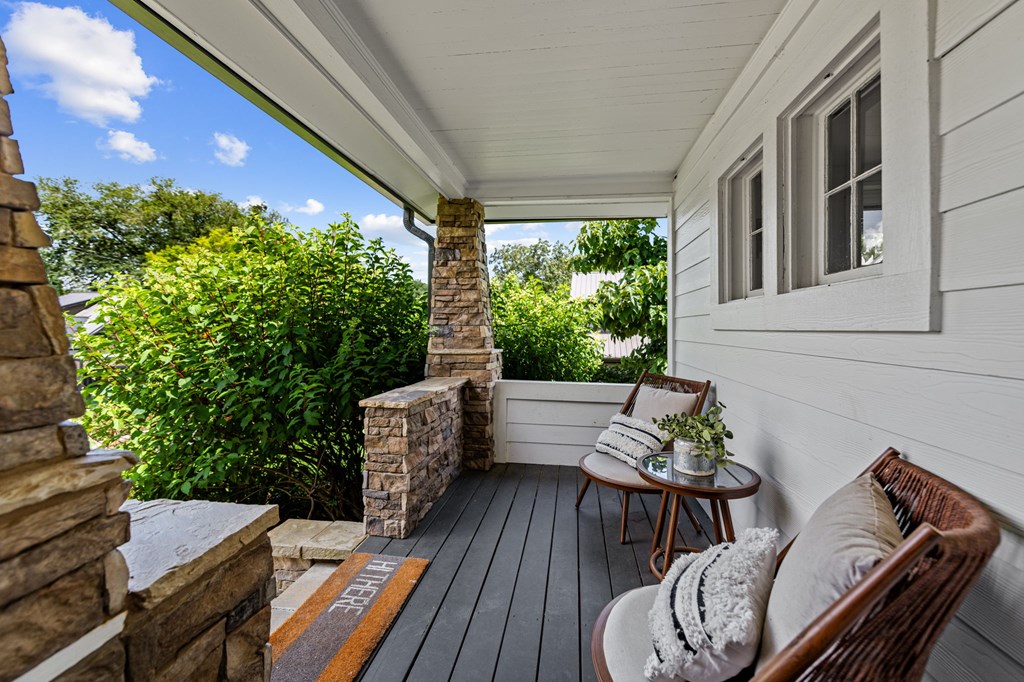 70 McKinney Street Blue Ridge, GA 30513 - Photo 69 of 79 a view of a patio with couches table and chairs and potted plants