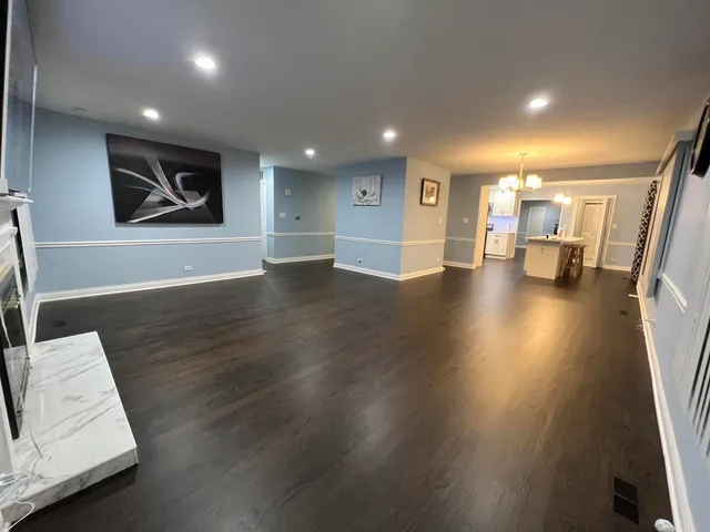 a view of a living room and dining room
