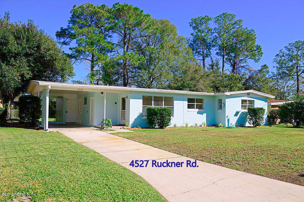4527 Ruckner Road Jacksonville, FL 32207 - Photo 1 of 15 a front view of a house with a garden