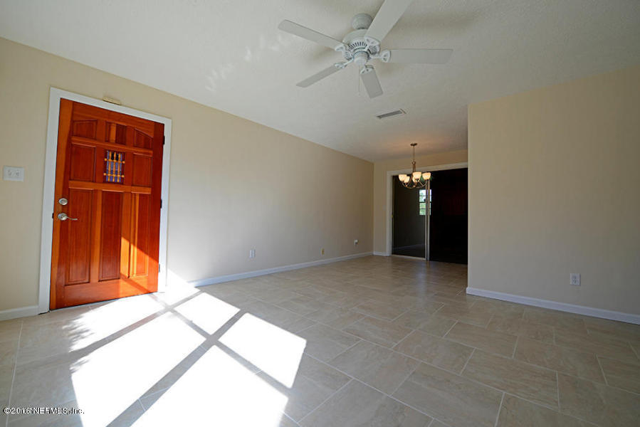 4527 Ruckner Road Jacksonville, FL 32207 - Photo 5 of 15 a view of an empty room with a window