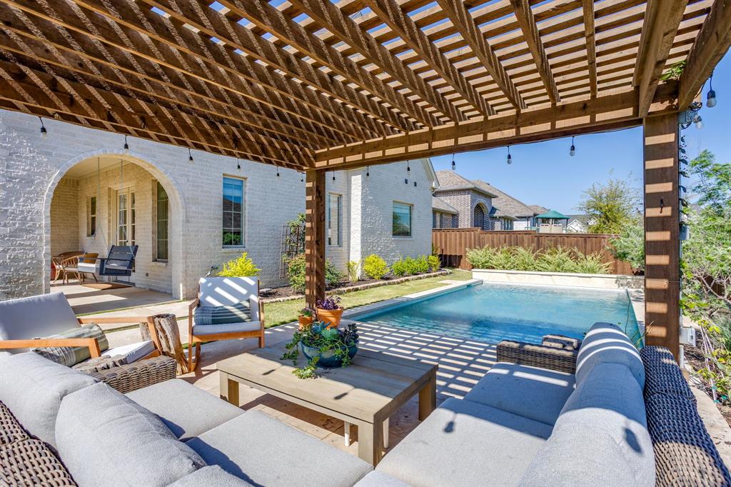 14000 Rozana Street Fort Worth, TX 76008 - Photo 37 of 38 a view of swimming pool with outdoor seating