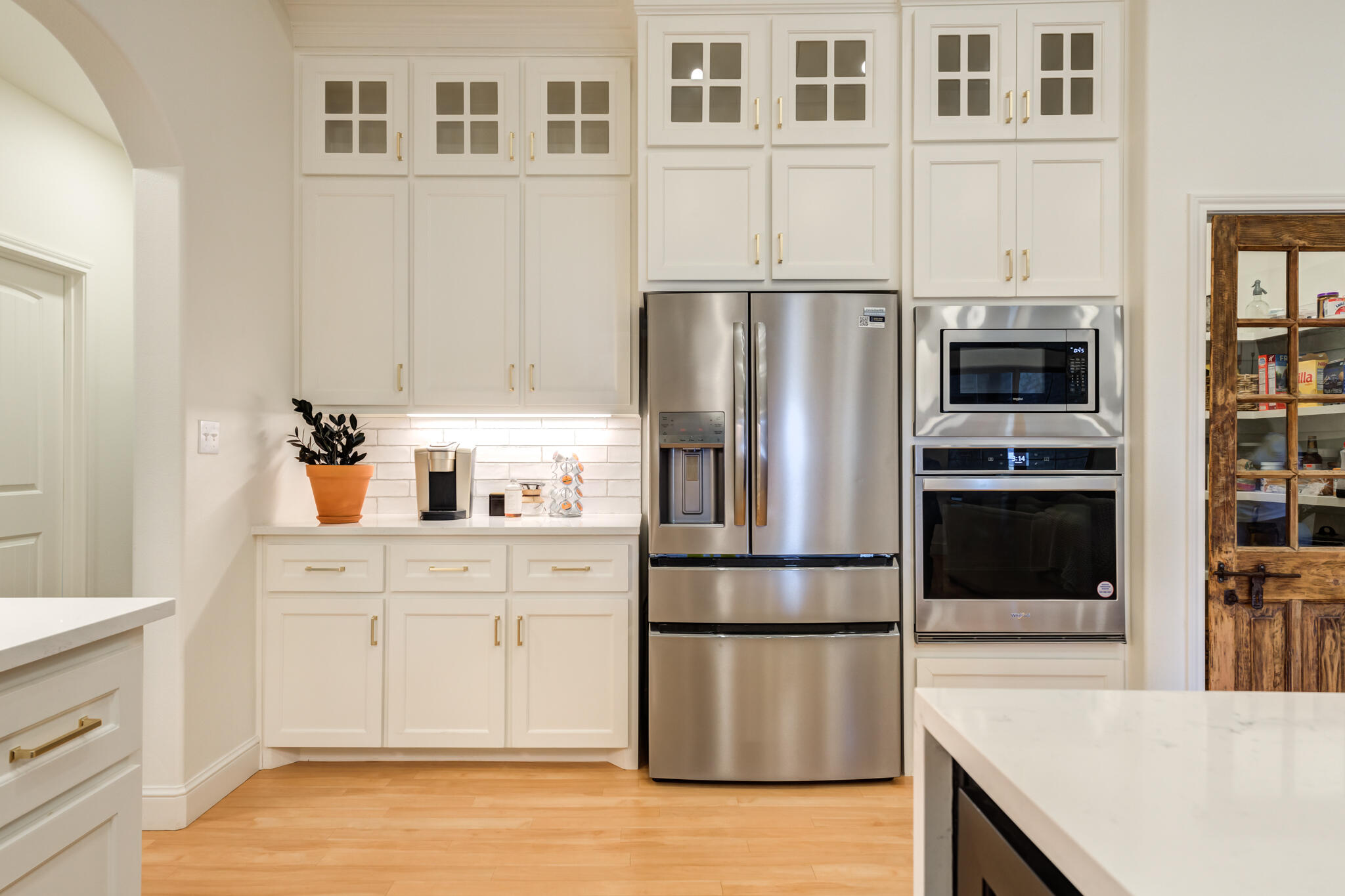 7819 55th Street Lubbock, TX 79407 - Photo 20 of 39 a kitchen with stainless steel appliances and refrigerator