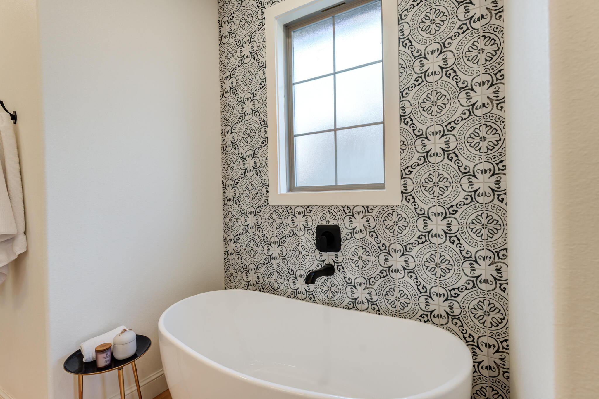 7819 55th Street Lubbock, TX 79407 - Photo 32 of 39 a bathroom with a bathtub and a shower