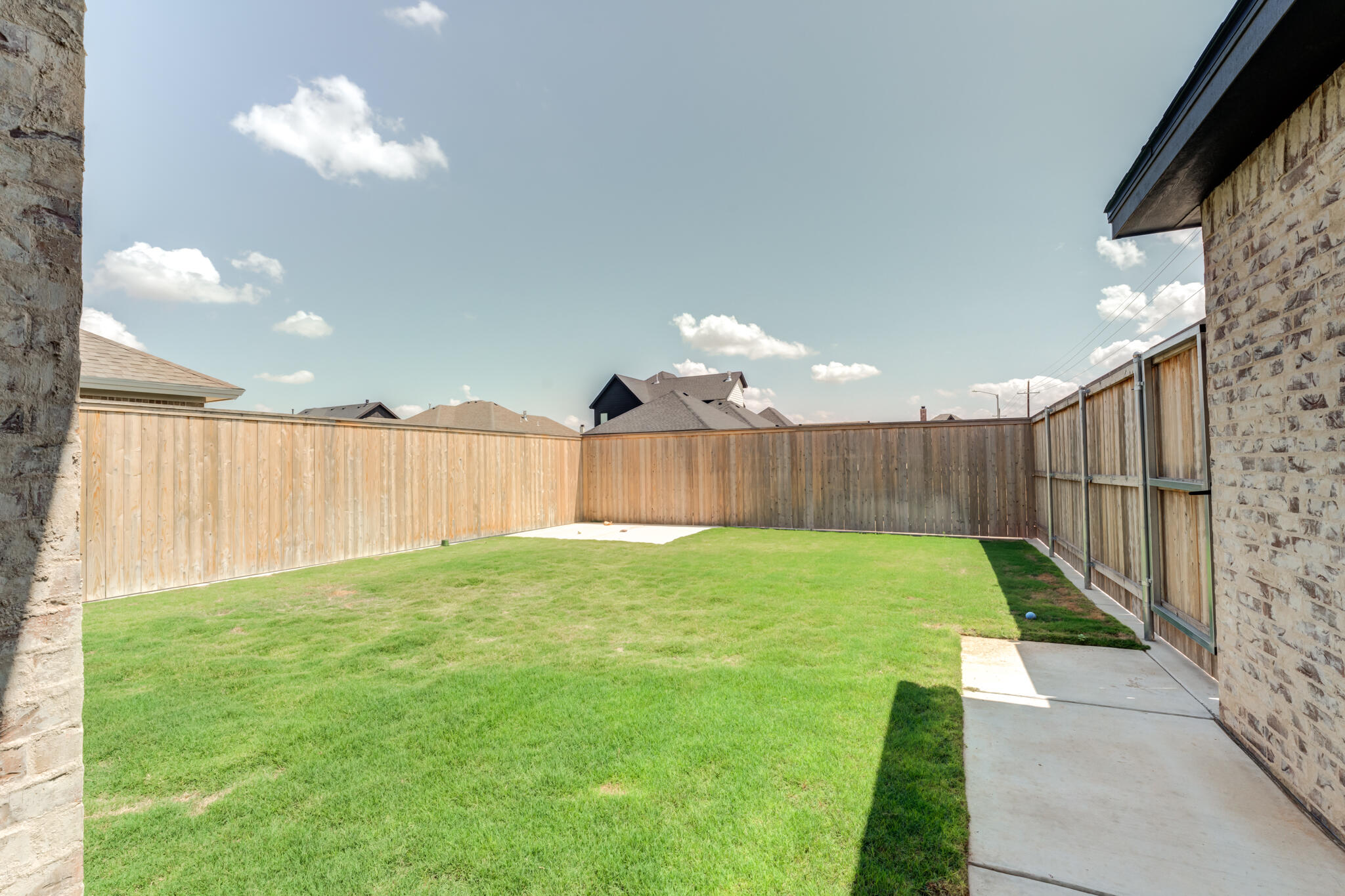 7819 55th Street Lubbock, TX 79407 - Photo 38 of 39 a view of a backyard with a garden
