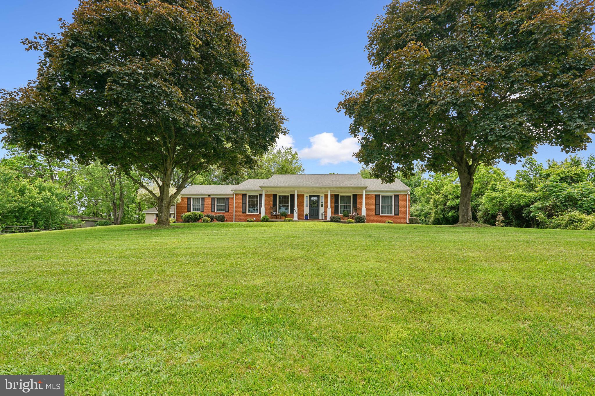 410 Star Rte Road Elkton, MD 21921 - Photo 1 of 40 a front view of a house with garden