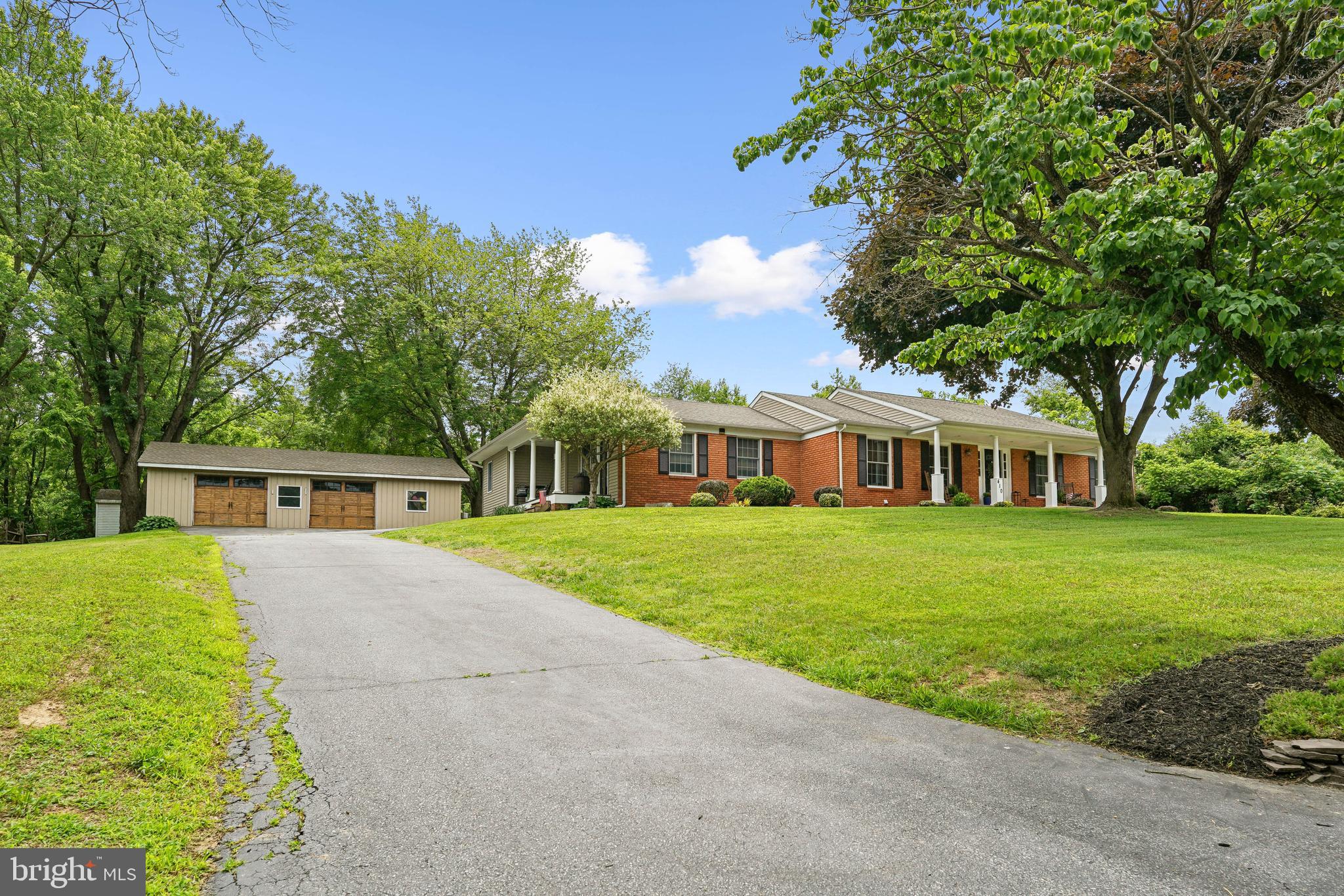 410 Star Rte Road Elkton, MD 21921 - Photo 2 of 40 a front view of a house with a garden