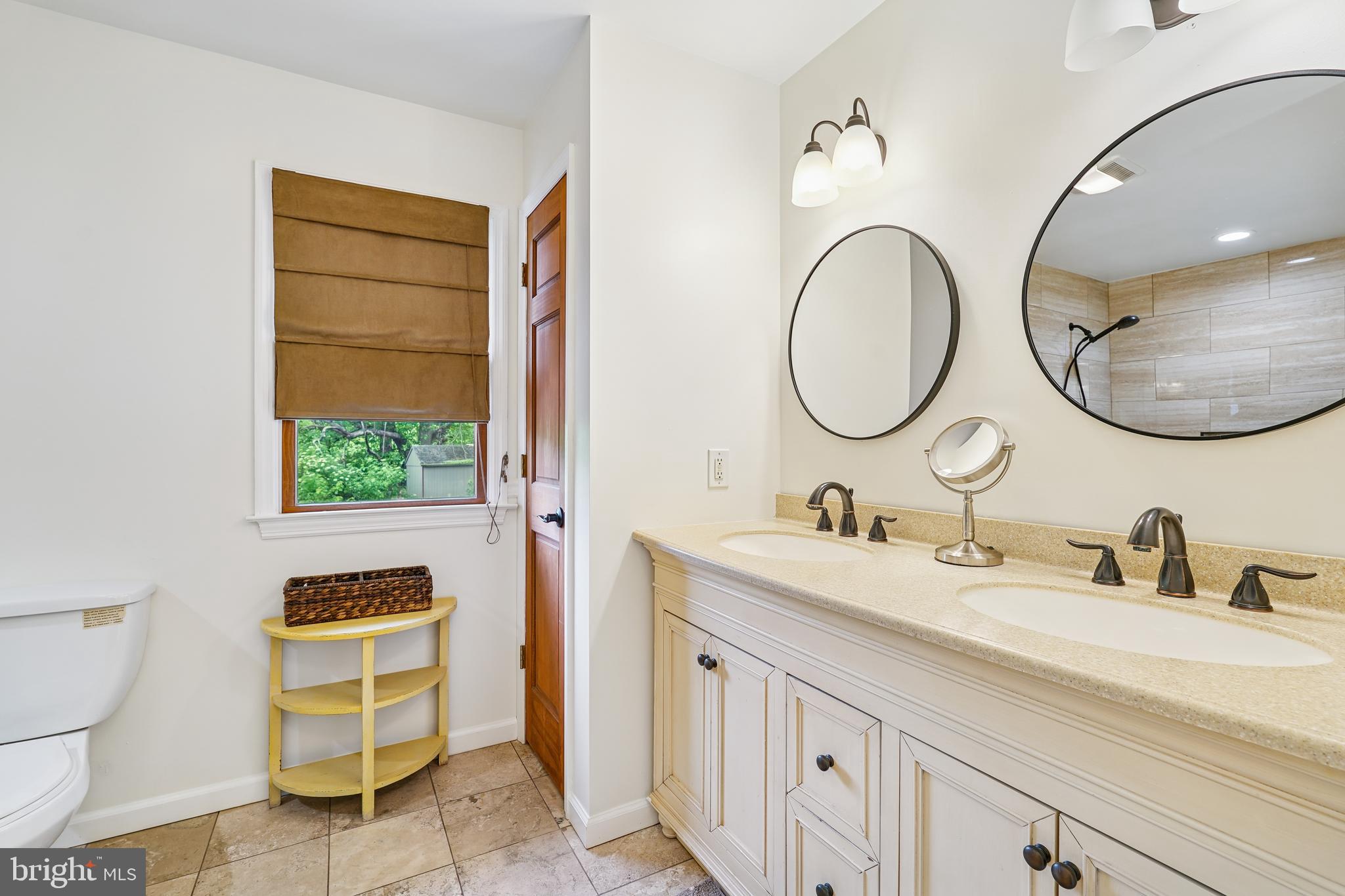 410 Star Rte Road Elkton, MD 21921 - Photo 22 of 40 a bathroom with a sink and a mirror
