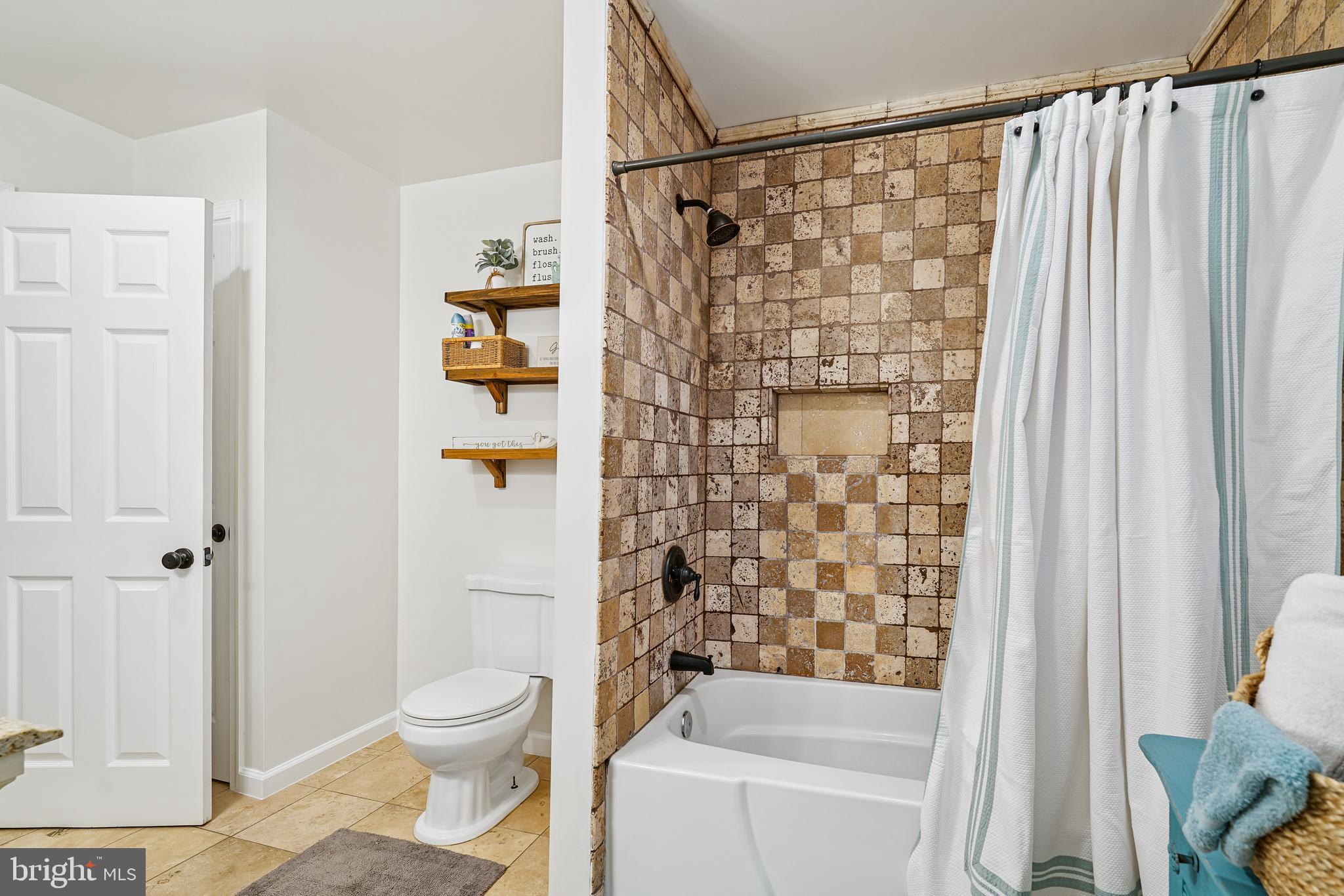410 Star Rte Road Elkton, MD 21921 - Photo 30 of 40 a bathroom with a shower curtain and a toilet