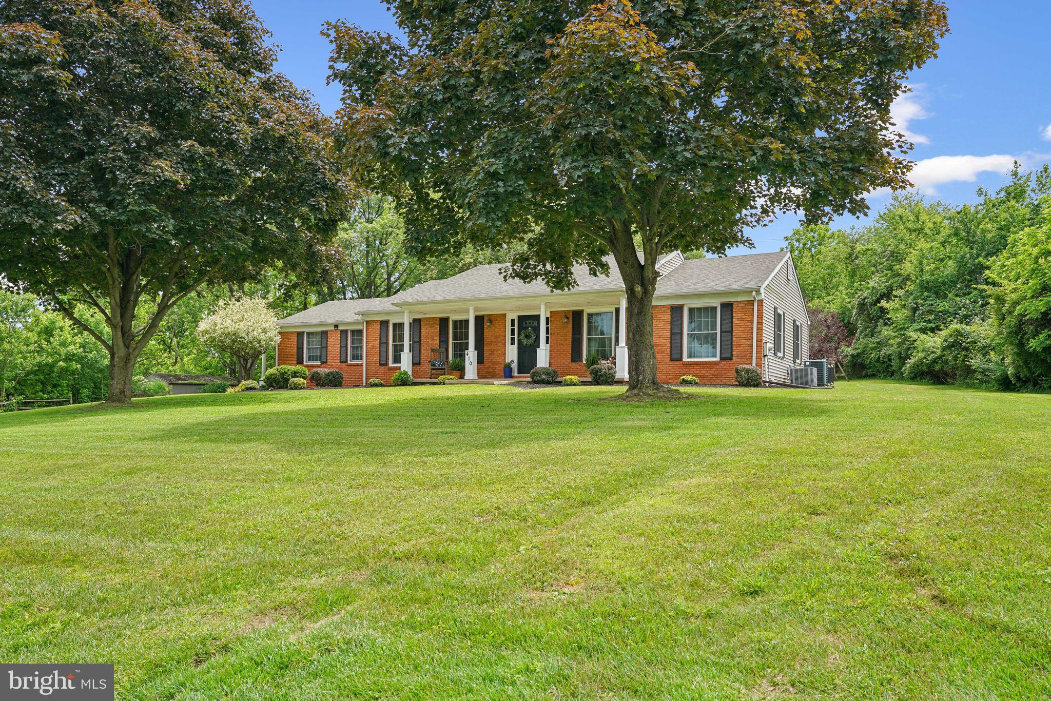 410 Star Rte Road Elkton, MD 21921 - Photo 3 of 40 a front view of house with yard and green space