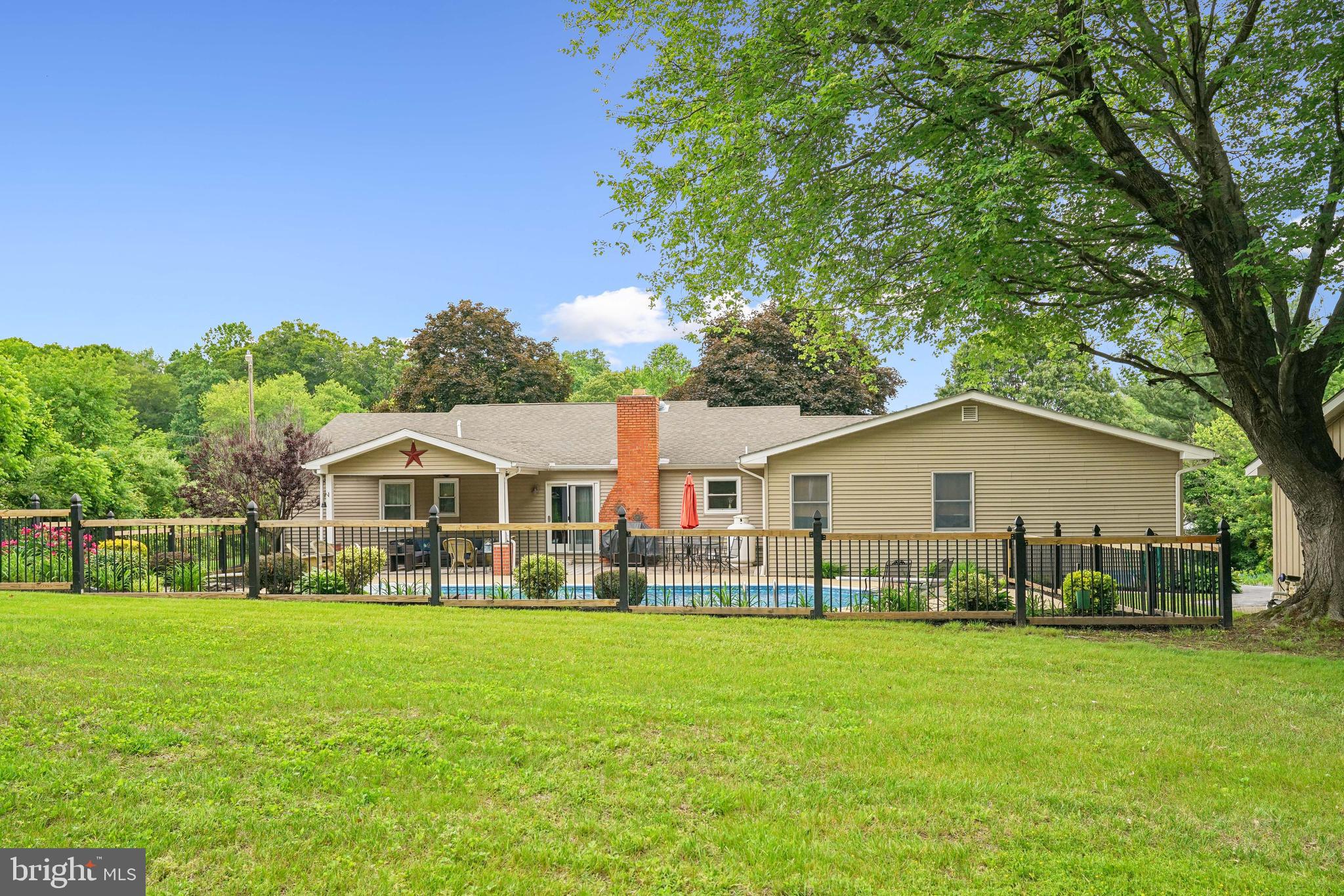410 Star Rte Road Elkton, MD 21921 - Photo 39 of 40 a front view of house with yard and green space