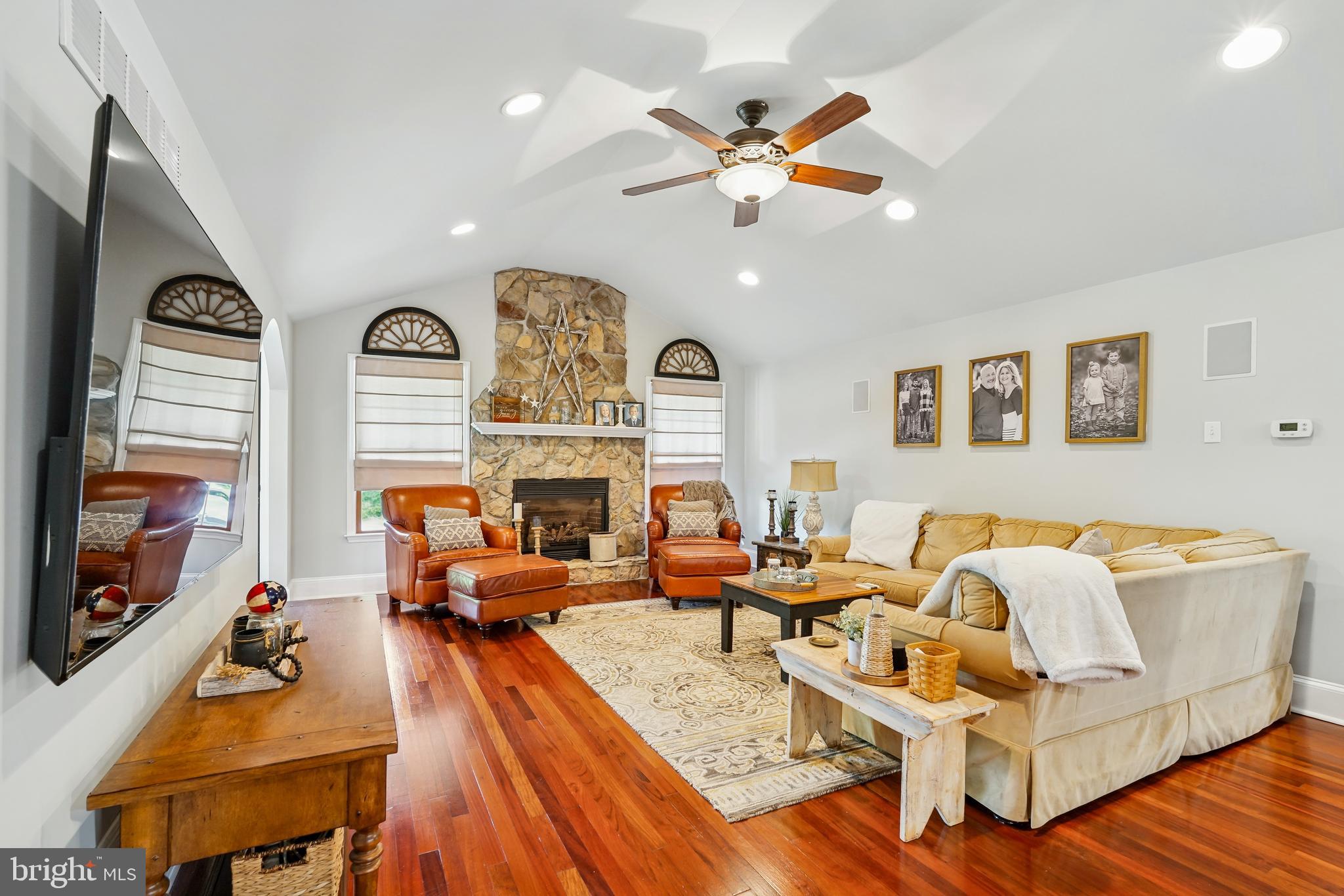 410 Star Rte Road Elkton, MD 21921 - Photo 9 of 40 a living room with furniture fireplace and a flat screen tv
