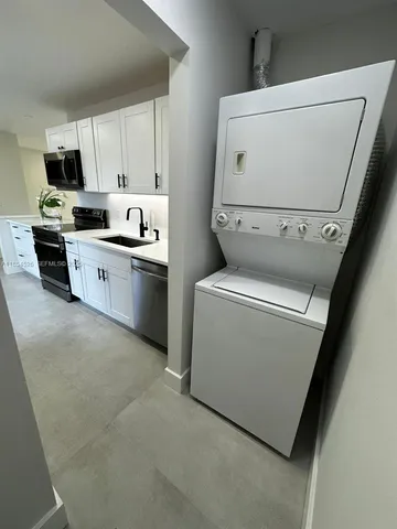 a view of a park with large trees