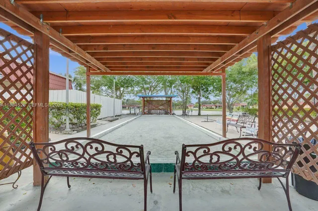 a view of a dining room with furniture and a livingroom