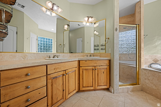 20 Valley Road Leeds, UT 84746 - Photo 22 of 57 Dual sink vanity with wood cabinetry and light-toned countertops
