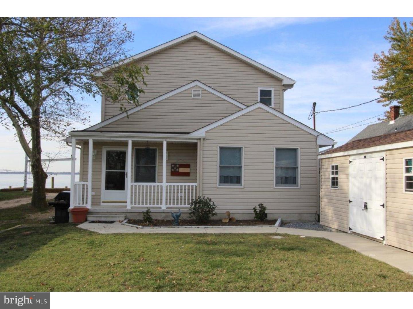 741 Salem Fort Elfsborg Road Salem, NJ 08079 - Photo 1 of 1 a front view of a house with a yard
