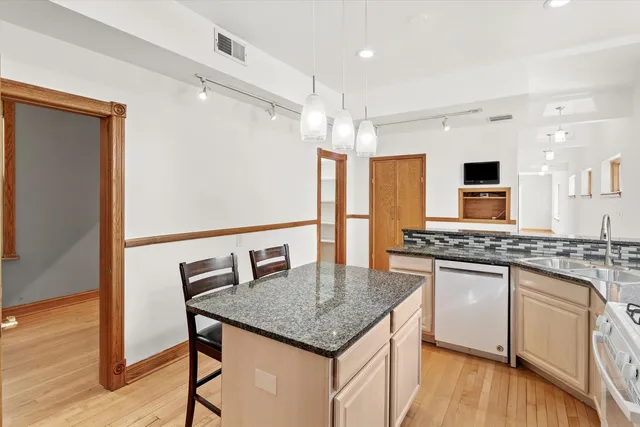 a view of room with window and cabinet